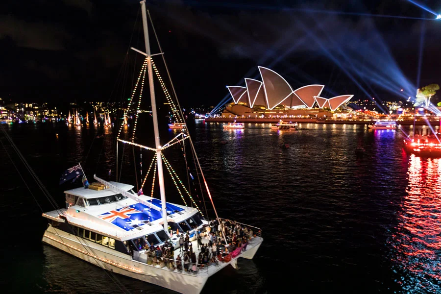 Guests celebrating Australia Day on a Legend Cruises harbour cruise